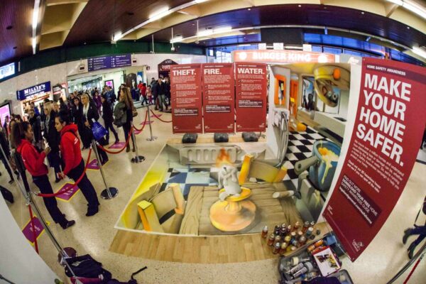 Legal & General illusion at Leeds train station, painted by Chu – Photography by Scott Salt